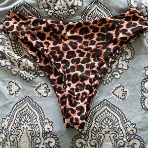 Cheeky high waisted leopard print bikini bottom.